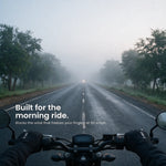 Rider wearing Dirts winter gloves on a foggy morning road
