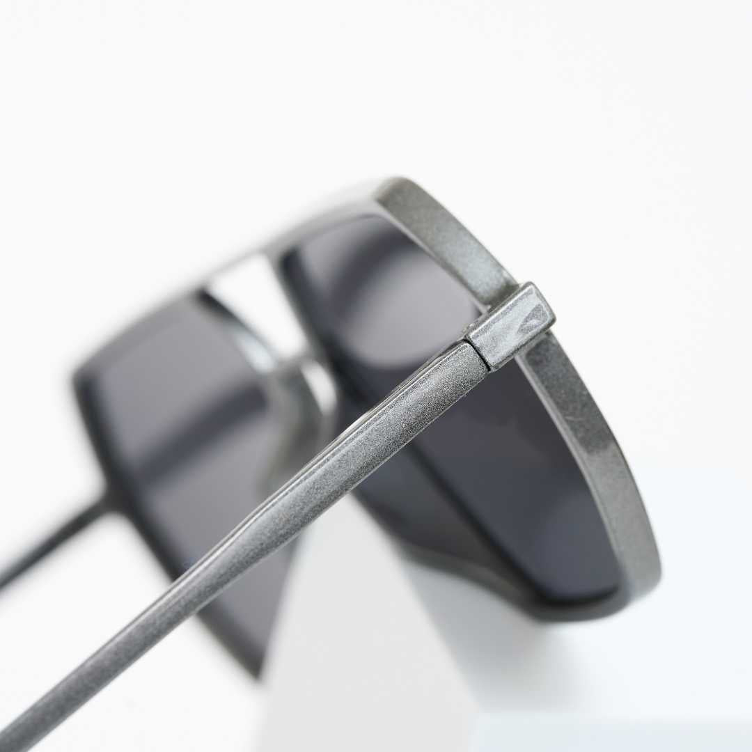 Close-up of Grey Sigma sunglasses frame detail