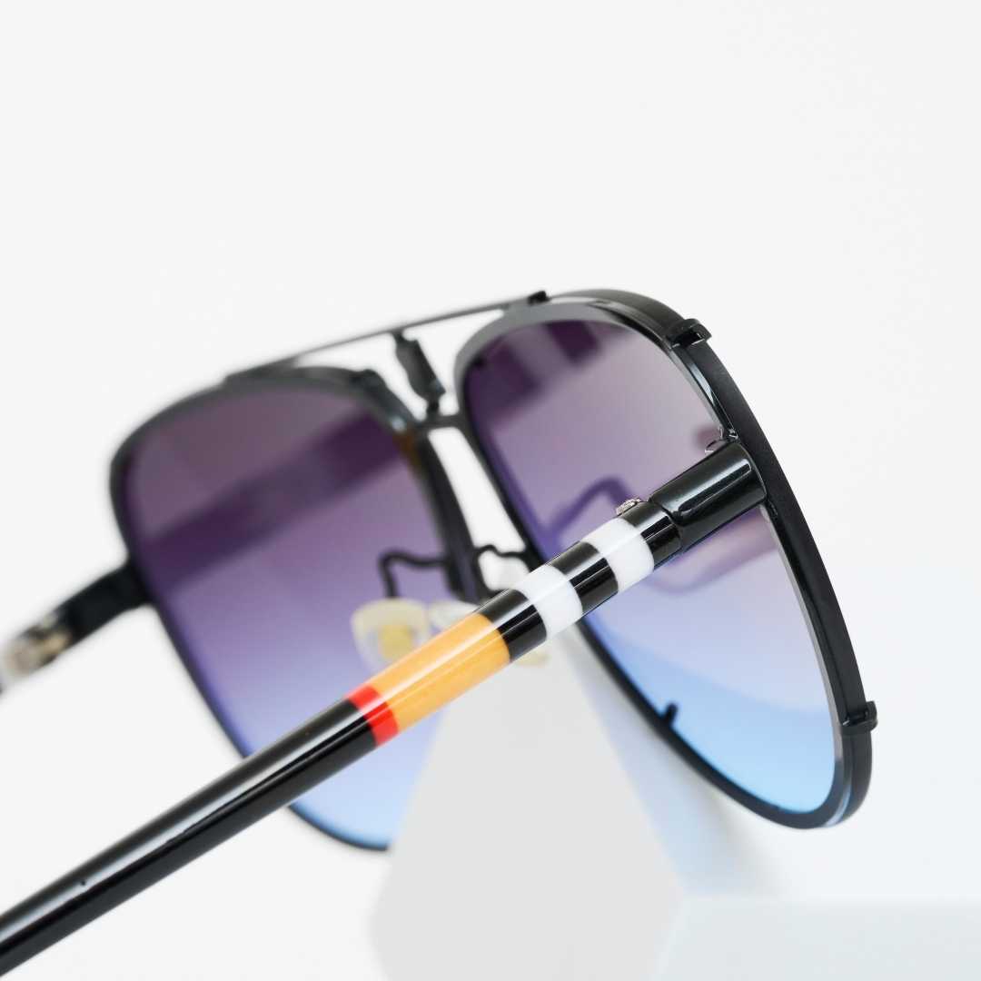 Close-up of black blue dark shade sunglasses arm detail