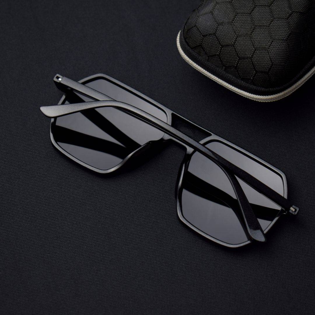 Black Sigma Dark Shade sunglasses with folded arms