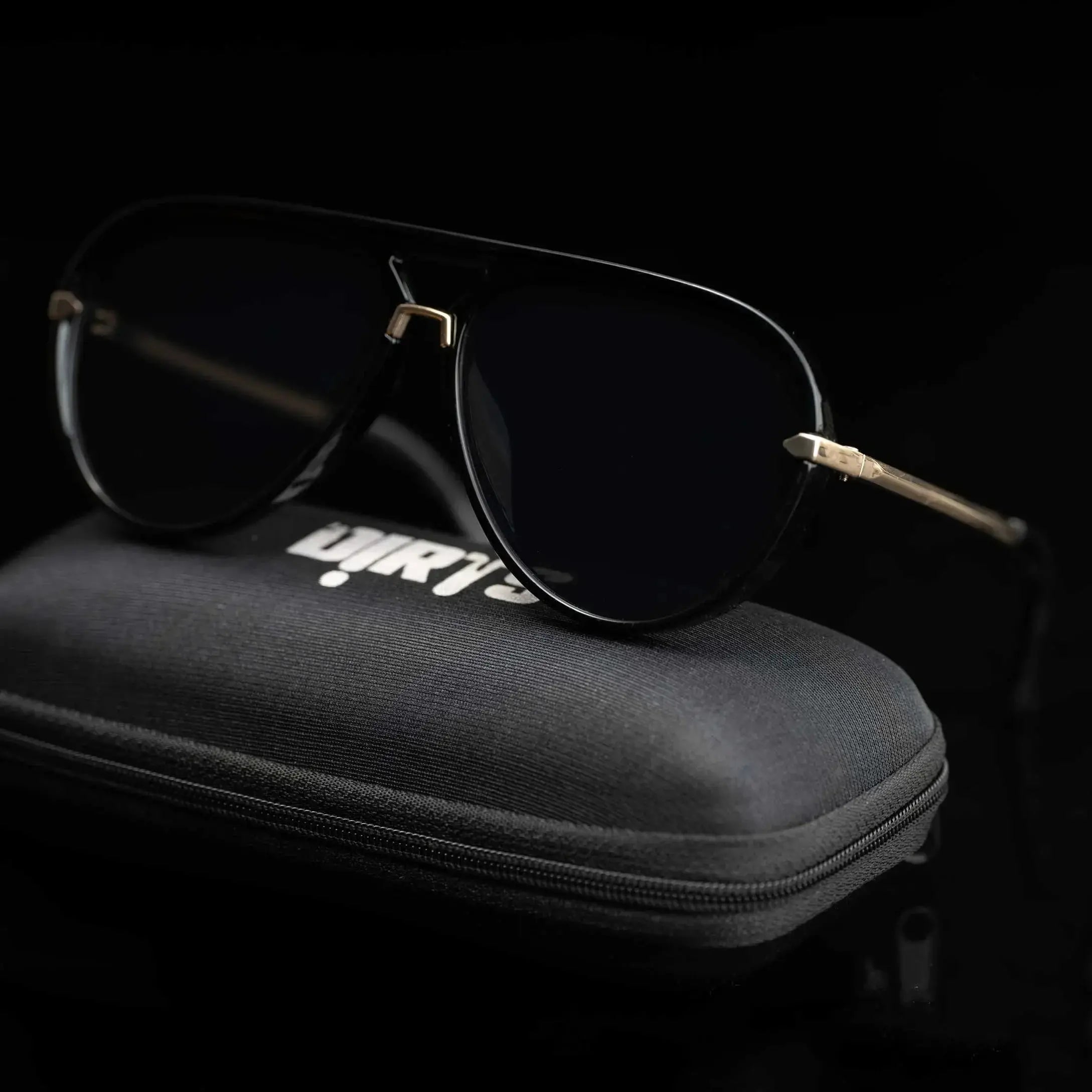 Solar Surge Shade sunglasses on black case, dark setting