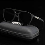 Ashura Dark Shade sunglasses displayed on black case