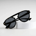 Cosmic Trinity Black Shade sunglasses on white surface