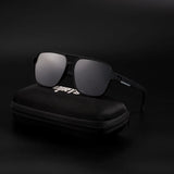 Retro style dark shade sunglasses with case, black background