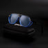 Arctic Aura Shade sunglasses with blue lenses on black case