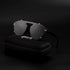 Cosmic Trinity Black Shade sunglasses on black case