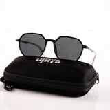 Dark black sunglasses with case on white background