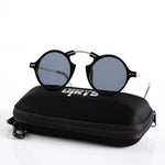 Vertex Voyager Shade sunglasses with blue lenses on case