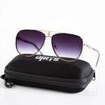 Stylish gold blue sunglasses with gradient lenses on case