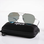 Apex Aqua Shade sunglasses with green lenses on case